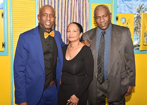 Barbados Canada Association Chair & President Mark Hoyte (left) poses with guests during the gala.